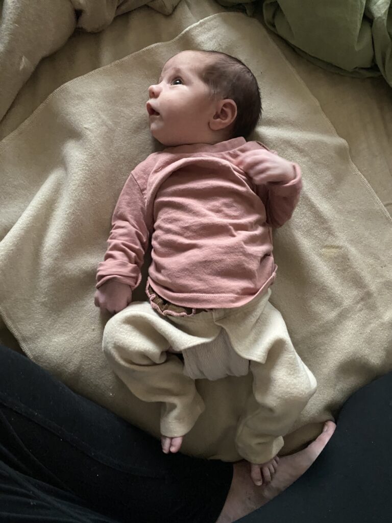 Dressed for elimination communication at 2 weeks old